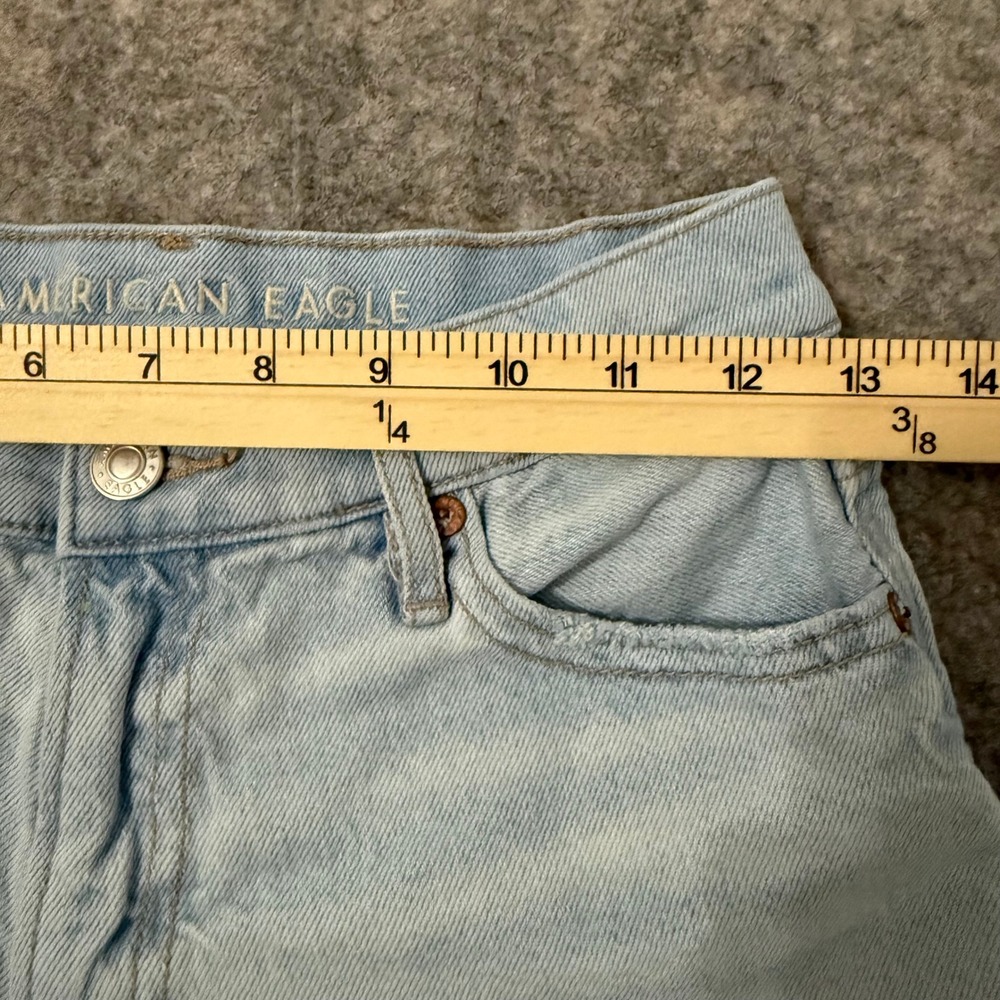 American Eagle Strigid Light Wash Mid Waisted Distressed Denim Shorts Size 00 - Picture 6 of 9